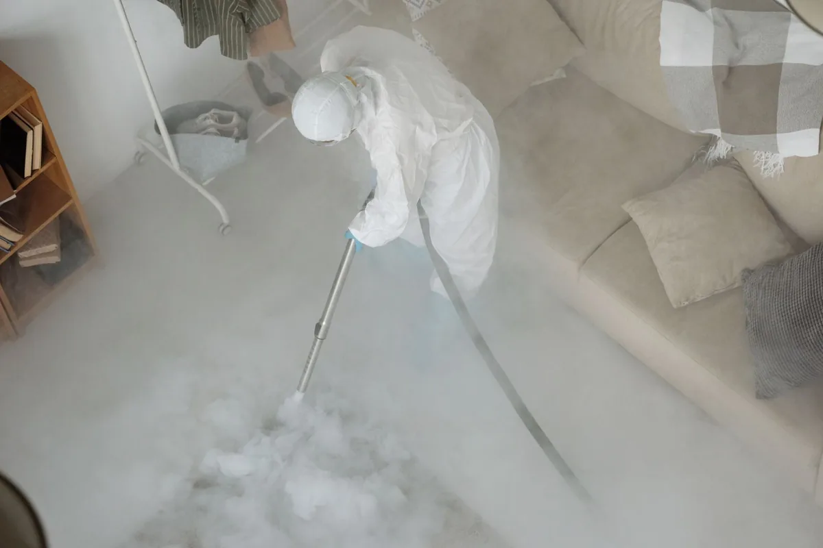 Biohazard cleanup technician in protective equipment, Ringgold, GA